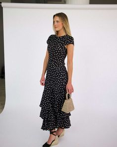 The Carmen is our new party silhouette. Adorned with classic polka dots, and a cascading tiered ruffle skirt. Ideal for garden parties, elegant dinners, or special occasions THE CUT Soft flutter sleeves Bias-cut and unlined for the best drape Viscose crepe Dry Clean Polka Dot Tiered Dress With Ruffles, Tiered Polka Dot Dress With Ruffles, Polka Dot Ruffled Evening Dress, Polka Dot Ruffle Dress For Evening, Polka Dot Ruffled Dress For Evening, Polka Dot Party Dress With Ruffle Hem, Polka Dot Dress With Ruffle Hem For Party, Elegant Polka Dot Dress With Ruffles, Party Silhouette