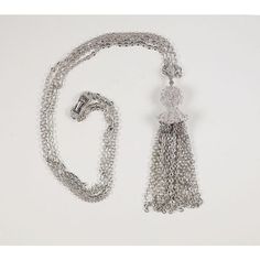 This is part of Chairish’s Costume Jewelry assortment.  Double chain silvertone necklace with a textured cap multi chain tassel. H 4 1/2 in. x W 28 in. Elegant Metal Tassel Necklace, Elegant Silver Metal Tassel Necklace, Silver Metal Tassel Necklace, Silver Long Tassel Necklace, Elegant Dangle Tassel Necklace, Elegant Long Tassel Necklace With Fringe, Elegant Fringe Necklaces For Evening, Elegant Long Fringe Necklace, Elegant Evening Fringe Necklace