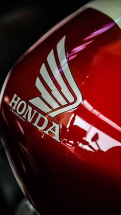 the honda logo is on the side of a motorcycle