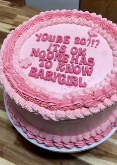 a pink birthday cake with the words you're boy? it's ok no one has to know babygirl