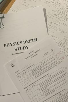 some papers are stacked on top of each other with the words physics depth study written above them