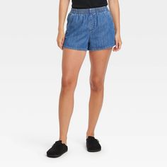 Bring comfort to warm-weather days with these Mid-Rise Pull-On Shorts from Universal Thread™. Made from midweight cotton-lyocell blend fabric in a relaxed fit, these mid-rise shorts feature a full elastic waistband for a secure fit. The two side stash pockets provide space for small essentials, while the denim weave in a solid hue makes them a great pairing with different sweaters, tees or blouses. Universal Thread™: Found exclusively at Target. Weather Day, Mid Rise Shorts, Bottom Clothes, Universal Thread, Warm Weather, Mid Rise, Two By Two, Target, Thread