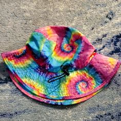 Such A Cute Bucket Hat! Rainbow Tie Dye Pattern With Am Adjustable Tie Under For Your Neck :) Perfect For Getting Wet And Drying Easily For All Summer Events. Or Wear To A Festival For A Fun Accessory. Never Worn Adjustable Pink Sun Hat With Uv Protection, Blue Adjustable Bucket Hat For Beach, Adjustable Blue Bucket Hat For Beach, Adjustable Pink Casual Sun Hat, Casual Pink Sun Hat With Adjustable Fit, Casual Adjustable Pink Sun Hat, Trendy Pink Adjustable Sun Hat, Casual Pink Adjustable Sun Hat, Casual Pink Hats With Adjustable Fit