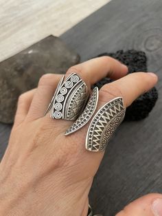 You can choose between 4 different and unique sterling silver rings. Each has a different style and design, but all are perfect for your day by day outfits and super comfy and easy to match with other accessories and any outfit. In one of the pictures you can see a number that represents each ring for you to choose from. Ring #1- Size 8.75, can be open to a bigger size but this will create a gap in the front. And the ring is 2.7cm- 1.10 inch long Ring #2- Size 8.5 , can be open to a bigger size Unique Handmade Wide Band Round Ring, Silver Toe Ring With Unique Design, Unique Silver Open Ring, Unique Metal Midi Rings, Silver Open Ring With Unique Design, Artistic Metal Rings With Unique Design, Artistic Open Ring In Metal, Artistic Metal Open Ring, Handmade Sterling Silver Wide Band Open Ring