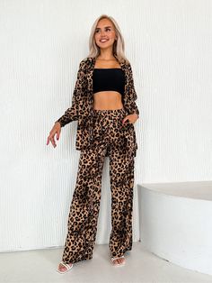 Elevate your bedtime look with our Sexy Leopard Print Cardigan Pajama Set. This two-piece ensemble features a stylish leopard print cardigan with a matching long-sleeve top and long pants. Perfect for the fall season, indulge in luxurious comfort and captivating style with this must-have sleepwear set. Female Sleepwear, Fashion Pajamas, Linen Nightgown, Ladies Nightwear, Pajama Set Long, Leopard Print Cardigan, Sleepwear Sets, Women Nightwear, Print Pajamas