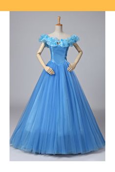 a blue ball gown with ruffles and flowers on the boms is displayed