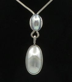 "SEBRI 925 Silver - Vintage Cabochon Cut Mother Of Pearl Necklace - NE3808  Jewelry Type:          Necklace  Metal Type:             925 Silver  Metal Size:              3.5\" Pendant 23.5\" Chain  Stone Type:             Mother Of Pearl  Condition:               N/A  Jewelry Weight:      38.7 Grams  PLEASE NOTE: THIS ITEM IS PRE-OWNED. ALTHOUGH MOST ITEMS ARE IN VERY GOOD CONDITION, SOME MAY NEED CLEANING AND/OR MINOR REPAIRS. WE MAKE A VERY STRONG EFFORT TO UPLOAD CLEAR PICTURES. PLEASE INSPEC Formal Teardrop Cabochon Necklace, Silver Drop Jewelry With Shiny Finish, Oval Silver Jewelry With Shiny Finish, Anniversary White Gold Cabochon Necklace, Classic Silver Oval Cabochons, Silver Round Cabochons For Formal Use, Silver Round Elegant Cabochons, Classic Oval Silver Cabochons, Silver Necklace With Shiny Finish For Anniversary