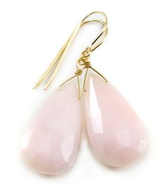 Pink Peruvian Opal earrings. Beautiful shade of soft pink in a faceted teardrop cut. High quality french earwires - either 14k solid yellow gold or 14k gold filled or sterling silver available - you choose. Gemstone size is 15x25mm, over 30 carats, earrings hang 1.5 inches. Naturally lightweight to wear for larger earrings. The mannequin shows the relative size and how they will hang. Please check out my store for more gemstone earrings, bracelets and necklaces. Peruvian Opal, Earrings Pink, Opal Earrings, Large Earrings, Tear Drop, Solid Yellow, Gemstone Earrings, Soft Pink, Solid Gold