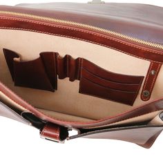 Experience the elegance of a true Italian leather briefcase. Handcrafted with precision by skilled artisans in Tuscany, this briefcase embodies the essence of Italian craftsmanship. Made from 100% full-grain leather, it merges luxury and functionality seamlessly. Ideal for professionals, its semi-rigid structure and three compartments ensure ample space for documents, a laptop, and other essentials. Featuring antique brass or nickel hardware, this italian leather briefcase is built to last. The Timeless Rectangular Briefcase For Business, Leather Rectangular Satchel For Business Meetings, Timeless Briefcase For Daily Use, Timeless Rectangular Laptop Bag With Leather Lining, Timeless Rectangular Briefcase With Leather Lining, Elegant Satchel Briefcase With Leather Lining, Business Meetings Satchel Briefcase, Classic Rectangular Briefcase With Leather Lining, Luxury Cognac Briefcase For Business Trips