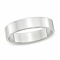 a white gold wedding ring on a white background