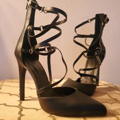 This Sexy Black Pointed Toe Heels Are From Charlotte Russe. The Straps Are Criss-Cross, Sure To Make Your Feet Look Even Sexier. Women's Size 9. Never Been Worn! Strappy 4-inch Heels For Night Out, Chic Closed Toe Club Heels, Chic Strappy Heels For Club, Chic Strappy Heels For Night Out, Chic Ankle Strap Heels For Club, Chic Heels With Open Side Vamp For Evening, Edgy Ankle Strap Heels Fitted, Black Strappy Heels For Night Out, Edgy Pointed Toe Heels For Club