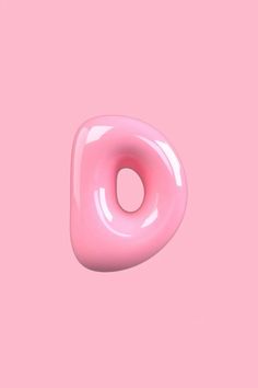 a pink donut on a pink background