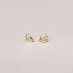 gold moon stud earrings by jaxkelly Minimalist Moon-shaped Sterling Silver Cartilage Earrings, Minimalist Moon-shaped Cartilage Earrings, Dainty Moon Phase Earrings, Dainty Half Moon Charm Earrings, Dainty Half Moon Earrings With Moon Charm, Gold Crescent Cartilage Earrings, Minimalist Hypoallergenic Crescent Earrings, Minimalist Half Moon Earrings For Gift, Dainty Moon-shaped Earrings