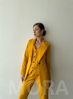 Blazer length is 27,1 inches or 69cm Sleeve length is 24,4 inches or 62 cm Pants outer seam length is 39,3 inches or 100 cm Vest length is 18,5 inches or 47 cm The model's in photos  wearing a size XS (2 US numeric) Her measurements: height 5'6 or 167 cm, bust 30.7 inches or 78 cm, waist 23.6 inches or 60 cm, hips 35.8 inches or 91 cm XS= 2 US numeric BUST 32-34 inches or 82-86 cm WAIST 23-24.8 inches or 59-63 cm HIPS 33-35 inches or 86-90 cm S= 4 US numeric BUST 34-35 inches or 86-90 cm WAIST 2 Classic Yellow Suit For Work, Classic Yellow Suits For Work, Tailored Yellow Suit For Office, Yellow Tailored Suit For Office, Yellow Notch Lapel Suit For Work, Yellow Notch Lapel Suits For Work, Fitted Yellow Suits For Workwear, Elegant Yellow Pantsuit For Formal Occasions, Yellow Fitted Pantsuit For Work