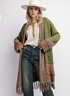 Enjoy the cozy and relaxed fit of the Collette Fringe Sweater Cardigan! With its open front design and side pockets, this cardigan is perfect for keeping warm and stylish. The midi length adds a touch of sophistication, making it a versatile addition to any outfit. 51% ACRYLIC, 35% polyester, 14% nylon xl can do a large Boho Grunge, Fringe Sweater, Woven Pattern, Trendy Boho, Cozy Knit, Curvy Dress, Pattern Sweater, Cozy Knits, Small Waist