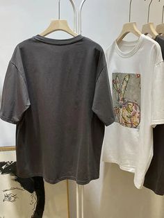 This is perfect for those who are looking for a clothing for a good price. It is fashionable, stylish, and it will look great on anyone who wears it. Do you wanahavit? Gray Oversized Short Sleeve T-shirt, Gray Oversized Short Sleeve Top, Oversized Gray Short Sleeve T-shirt, Trendy Gray Short Sleeve Tops, Gray Graphic Print Short Sleeve Tops, Gray Short Sleeve Tops With Letter Print, Gray Short Sleeve Graphic Tee Tops, Gray Short Sleeve Graphic Tee, Casual Gray Graphic Print Top