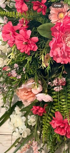 a bunch of flowers that are sitting on a table