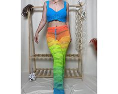 Hey there, beautiful soul! 🌈 Step into summer with our Handmade Crochet Pants and Top Set! This colorful bohemian ensemble features vibrant trousers and a chic crop top, handcrafted from breathable cotton. Perfect for beachwear or summer parties, it's a must-have for any free spirit. Embrace comfort and style - snag yours today️ ATTENTION SIZE:  Small-Medium Welcome to our exclusive sample product discount! Presenting a unique and exquisite item crafted with love and meticulous attention to det Bohemian Bottoms For Summer Beach Party, Bohemian Bottoms For Beach Party Season, Bohemian Bottoms For Beach Party, Bohemian Bottoms For Beach Party In Summer, Bohemian Beach Party Bottoms, Bohemian Fitted Bottoms For Festivals, Hippie Multicolor Bottoms For Beach Season, Bohemian Fitted Bottoms For Summer, Multicolor Pants For Beach And Spring Season