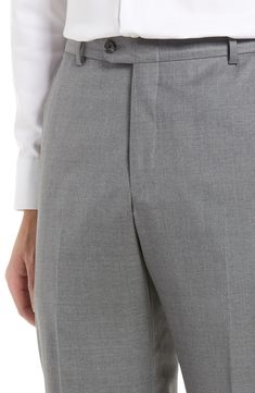 These relaxed trousers crafted from finely textured super-130s Italian wool are treated with beeswax to repel water, resist stains and enhance breathability. Style Name:Hickey Freeman B Series Honeyway Relaxed Fit Dress Pants. Style Number: 6229661. Solid Wool Pants With Welt Pockets, Wool Pants With Welt Pockets, Wool Flat Front Pants, Classic Business Pants With Hidden Pockets, Solid Wool Tapered Leg Pants, Solid Wool Business Pants, Relaxed Trousers, Fitted Dress Pants, Flat Front Pants