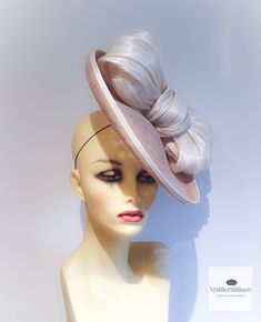 Beige / sand small saucer fascinator /  hat / hatinator with an ivory contemporary silk bow This style suits everyone its a pervect size!  Blocked wired and finished by hand. Can be made in any colour Kentucky Derby Party Hat With Satin Bow, Elegant Hat With Satin Bow For Party, Elegant Party Hat With Satin Bow, Kentucky Derby Evening Hat With Satin Bow, Elegant Bow Hat For Kentucky Derby, Elegant Evening Hat With Satin Bow, Elegant Cream Hat With Bow, Party Hat With Bow And Curved Brim, Elegant Wedding Hats With Satin Bow