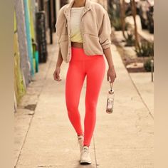 These Ultra-Flattering Leggings Transition To Brunch, Bikram And Beyond. The Fit: High-Rise Waist; 7/8 Crop The Feel: Ultra-Soft; Holds-You-In Waist The Features: Ribbed Knit Design; Spf 30 Uv Protection Why We Them: They're A Wear-Everyday, Tried-And-True Fave Fp Movement A Destination For The Life Well-Lived, Free People Movement Offers Performance-Ready Activewear, Practice-Perfect Styles And Beyond-The-Gym Staples. We Believe In The Power Of Community, In Supporting And Lifting Each Other Up Pink High Stretch Bottoms For Fall, Relaxed Fit Leggings For Gym, Relaxed Fit Workout Leggings, Tight Moisture-wicking Bottoms For Spring, Moisture-wicking Tight Bottoms For Spring, Spring Moisture-wicking Tight Bottoms, High Waist Pink Activewear With Elastic Waistband, Spring Yoga Leggings With Relaxed Fit, Tight Moisture-wicking Pink Bottoms