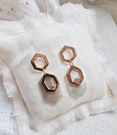 "Statement hexagon drop, dangle earrings in 925 sterling silver with some geometric pendant in Rose gold plating over the 925 silver. It has a small clear zircon which brings light.  > Metal: Sterling silver and sterling silver rose gold plated > Pendant size: 4,5 cm / 1,77\"inches  x 1,8 cm/ 0,70\"inches > Stone: 3 mm / 0,11\"inches Clear Zirconium As you can see the sterling silver plated rose cold is shinny and the parts remaining in sterling silver are matt silver in order to create more con Elegant Hexagon Earrings For Gift, Elegant Geometric Earrings As Gift, Elegant Geometric Earrings For Gifts, Elegant Gold Hexagon Earrings, Elegant Geometric Pierced Earrings, Elegant White Hexagon Jewelry, Elegant Silver Geometric Earrings, Modern Rose Gold Dangle Earrings, Modern Rose Gold Drop Earrings