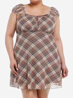 Aren't you plaid you stumbled upon this adorable babydoll dress? It features a classy brown plaid design with an empire waist and puffy elasticated sleeves  plus a dainty red rose at the center of neckline  which is lined with black lace. Comes with pockets!60% cotton; 40% modalWash cold; dry lowLength: 36"Stretchy materialImportedModel is 5'10"Model wears size 1 Babydoll Dress Plus Size, Plus Size Stores, Hot Topic Dresses, Puffy Dresses, Plaid Outfits, Brown Plaid, Plaid Design, Sweet Dress, Plus Dresses