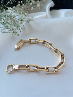 Solid 14K Italian Gold Chain Bracelet, Hollow Paperclip Bracelet, Thick and Heavy Link Chain Gold, Large Anchor Chain, Perfect Gift For  Our Beautiful 14K Gold Paperclip bracelets are made of authentic solid 14k gold. They are nicely polished and stamped for authenticity. This bracelet is a classic from every angle. Make a statement and wear on its own or layer it for more daring stack. PRODUCT DETAILS Made to order Material: 14K Gold Style: Semi Hollow  Width Size of the link: 6.5mm- 7.0mm Length of each link: 20mm-22mm Avg. Weight: 14.00 grams  Available Length : 5 to 8 inches  Sailor Lock Free Worldwide Shipping 📦 PACKAGING All items are nicely packaged ready to gift in elegant jewelry boxes. You can also leave a gift message for the recipient at checkout. 🚚 SHIPPING All items are han Gold Chain Paperclip Bracelet For Formal Occasions, Gold Paperclip Bracelet For Formal Events, Luxury Gold Paperclip Bracelet With Box Chain, Luxury Bracelets With Paperclip Chain, Gold Plated Paperclip Chain Bracelet For Formal Occasions, Formal Gold Plated Paperclip Bracelet With Chain Links, Formal Gold-plated Paperclip Bracelet With Chain Links, Luxury 14k Gold Bracelet With Paperclip Chain, Luxury Yellow Gold Paperclip Bracelet With Gold Chain