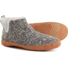 Keep feet cozy and comfortable on your day off with these TOMS Chunky Cable Lola slippers, made from soft cable-knit polyester with faux-fur lining and a cushioned footbed. Soft polyester upper Faux-fur lining High-top style with side slits Cushioned footbed Microfiber outsole Warm Comfy Slippers With Round Toe, Comfortable Warm Indoor Slippers, Comfortable Gray Winter Slippers, Cozy Synthetic Slippers With Round Toe, Comfortable Textured Footbed Slippers For Winter, Cozy Slippers With Round Toe, Cozy Gray Slippers With Round Toe, Comfortable Cozy Slippers With Round Toe, Cozy Synthetic Slippers With Textured Footbed