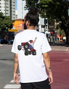 Our Unisex T-shirts are High Quality, SUPER comfy and Durable. Stylish Design and Relaxed Fit go Great with any Causal Occasion! They are made from 100% Cotton and hand-drawn. NO AI!   FABRICATION *Made with medium fabric (5.3 oz/yd² (180 g/m consisting of 100% cotton for year-round comfort that is sustainable and highly durable. *The tear-away label means a scratch-free experience with no irritation or discomfort whatsoever. *Made using 100% US cotton that is ethically grown and harvested. Gildan is also a proud member of the US Cotton Trust Protocol ensuring ethical and sustainable means of production. This blank tee is certified by Oeko-Tex for safety and quality assurance.   SIZING Unsure about sizing? Please Refer to the Size Chart below. S - Width cm: 45.72 - Length cm: 71.12 - Sleev White Relaxed Fit T-shirt For Outdoor Activities, Urban Tops With Graphic Print For Outdoor, Urban Style Tops With Graphic Print For Outdoor Activities, White Biker Tops For Streetwear, White Biker Style Tops For Streetwear, Biker Graphic Print Short Sleeve T-shirt, Short Sleeve T-shirt With Front Print For Outdoor, White Biker Top With Letter Print, White Cotton Biker T-shirt