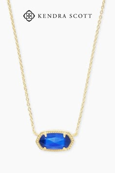 A dainty stone and delicate metallic chain combine to create the Elisa Gold Pendant Necklace in Cobalt Cat's Eye, your new favorite wear-anywhere accessory. This pendant Necklace can be paired with any look, providing that extra touch of timeless style. Make the Elisa Gold Pendant Necklace a staple in your wardrobe and you will not be disappointed. Royal Blue Kendra Scott Necklace, Kendra Scott Blue Necklace, Kender Scott, Kendra Scott Necklace Aesthetic, Kendra Scott Necklace Blue, Necklaces Preppy, Blue Kendra Scott Necklace, Cutesy Jewelry, Golden Birthday Gifts