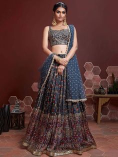 Everyone will admire you when you wear this affair. Add grace and charm to your appearance in this blue color digital print Chinon silk material lehenga beautified heavy embroidery work. Comes with similar color banglori silk sleeveless choli beautified real mirror and heavy embroidery work and heavy soft net dupatta. This digital print blue color silk lehenga is semi-stitched and can be customized in up to 42 sizes. price:- ₹3,999.00 Elaborate Embroidery, Blouse Lehenga, Mirror Work Lehenga, Sabyasachi Lehenga, Indian Lehenga Choli, Party Wear Lehenga Choli, Bollywood Lehenga, Lengha Choli, Blue Lehenga