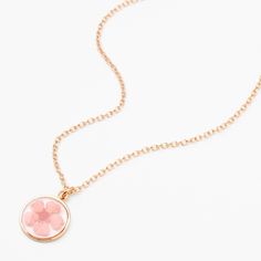 Flowers offer a touch of timeless beauty! This perfect bloom is encased in a clear round pendant that hangs from a matching gold-tone chain. Finish: Gold-tone Length: 16" + 3" extender Closure: Lobster clasp Material: Metal - Claire's Gold Framed Flower Pendant Necklace - Pink Rose Gold Flower Necklace With Round Pendant, Rose Gold Flower Pendant Necklace With Delicate Chain, Adjustable Round Pendant Necklace With Pressed Flowers, Adjustable Rose Gold Flower Pendant Necklace, Rose Gold Birth Flower Round Pendant Necklace, Elegant Adjustable Necklace With Pressed Flowers, Rose Gold Flower Necklace With Round Pendant For Birth, Elegant Adjustable Necklaces With Pressed Flowers, Mother's Day Flower Necklace With Round Pendant