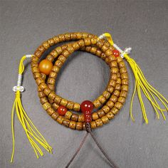 This old lotus seed mala was handmade from tibetan crafts man in Baiyu County,about 20 years old. It's composed of 108 lotus seed beads,then add some agate beads,1 pair of silver bead counters,and agate guru bead on it. Adjustable 108 Beads Mala Amulet, Adjustable Hand-strung Amulet Mala, Traditional Beaded Bracelets For Meditation With 108 Beads, Adjustable Amulet Mala For Rituals, Ritual Amulet Mala With 8mm Beads, Adjustable Round Beads Amulet Mala, Adjustable Amulet Mala With Round Beads, Adjustable Round Beads Mala Amulet, Adjustable Polished Beads Mala For Rituals