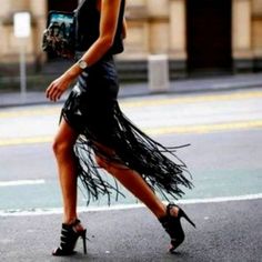 Chic Fringe Mini Skirt For Party, Black Fringe Mini Skirt For Party, Edgy Spring Party Mini Skirt, Glamorous Black Summer Skirt, Trendy Fringe Skirt For Party, Edgy Mini Skirt For Spring Party, Spring Party Mini Skirt With Edgy Style, Chic Fringe Skirt For Night Out, Edgy Black Mini Skirt For Evening