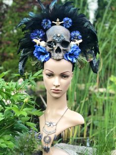 READY TO SHIP You are looking at a Hand-made SiminsCreations Headdress. If you want to make a statement with head wear, this is the piece for you. This feather skull beauty is perfect for any event - Renaissance Fair, Costume Parties, Masquerades, Festivals or whatever may strike your fancy. This one is in shades of blue and black. Shipping price is included in this listing. If you are interested in a matching Shrug (see example) please let me know: https://www.etsy.com/listing/291486629/design- Bohemian Crown Costume Hat For Costume Party, Horned Fantasy Headpiece For Festival, Fantasy Horned Headpiece For Festival, Bohemian Headpieces For Halloween Fantasy Events, Bohemian Headpieces For Halloween Costume Party, Mystical Halloween Festival Costume Hats And Headpieces, Fantasy Costume Hat With Tall Crown For Festivals, Fantasy Tall Crown Costume Hat For Festival, Gothic Headpieces For Carnival Festival