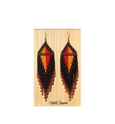 Earrings Beaded Black Red Yellow Chandelier Fire Native African Ankara Long Beadwork Seed bead  These elegant and fieric earrings made of high-quality Czech beads. They have a metal hook with gold plating.  Colors: Black + Red + Yellow + Gold  Length of the Earrings - 5.5 inches (14 cm)  100% Black Dangle Hoop Earrings For Festivals, Handmade Black Jewelry For Festivals, Black Bohemian Earrings With Ear Wire, Unique Black Beaded Dangle Earrings, Handmade Red Long Drop Jewelry, Red Beaded Dangling Earrings For Festivals, Red Beaded Earrings With Dangling Beads For Festivals, Red Beaded Earrings With Colorful Beads For Festivals, Yellow Beaded Drop Earrings