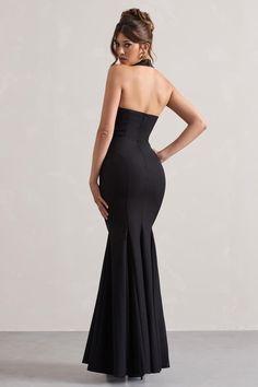 Make an statement at your next black tie occasion in Plaza. This black maxi dress has been cut in a premium crepe that hugs and sculpts your figure, Plaza boasta bold plunging neckline with halter straps. Style this fishtail maxi with a tousled bun and some gold earrings to let the dress do this talking. Features - Premium crepe- Halter neck- Plunge neckline- Sleeveless - Invisible zip closure - Fishtail hem- Maxi length Sizing & Fit Model is 5'7" and wears UK size 8 / US size 4Product Information Designed exclusively by Club L London Fully lined with no stretch Premium crepe in Black (86% Polyamide, 14% Elastane) 157cm total length SKU: CL131105002 Fishtail Maxi Dress, Leonie Hanne, Club L London, Christmas Party Dress, Information Design, Plunge Neckline, Invisible Zip, Black Maxi, Plunging Neckline