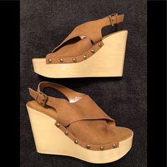 Brown Suede Wedge (Platform) Shoes With Gold Metal Studded Detailing On The Sides. Size 9. Buckle Closure. Brand New. Brand Name - A.N.A. (A New Approach) Trendy Wedge Sandals With Wooden Heel, Brown Suede Platform Wedge Sandals, Suede Wedge Sandals With Stacked Heel, Brown Suede Wedge Sandals, Brown Suede Wedge Heel Sandals, Shoes Brown, Suede Wedges, Shoes Color, Womens Shoes Wedges