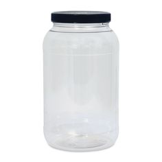 a clear glass jar with a black lid on a white background for storage and organization