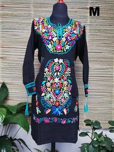 Beautiful Mexican dress embroidered in bright colors with silk thread, its sleeve is 3/4 with embroidered details on the cuffs. The embroidery for each dress is unique so the colors may vary. Mexican textile art has centuries of history and creativity throughout the country. Mexico is recognized as one of the leading countries with a beautiful artistic production in the textile world, miraculous hands of talented artisans from different states of the country create stunning embroidery clothing, Festive Multicolor Embroidered Dress With Long Sleeves, Festive Multicolor Long Sleeve Embroidered Dress, Traditional Multicolor Embroidered Long Sleeve Dress, Multicolor Long Sleeve Embroidered Dress For Festive Occasions, Multicolor Long Sleeve Folk Dress, Multicolor Folk Long Sleeve Dress, Multicolor Folk Dresses With Resham Embroidery, Multicolor Long Sleeve Dress With Resham Embroidery, Multicolor Resham Embroidery Long Sleeve Dresses