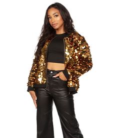 Enter the holiday function dripping in gold, class, and absolute style in the Women’s Gold Sequin Bomber Jacket. Dress up any seasonal outfit to the highest degree in sparkles and comfort! Whatever everyone came for is over – they’re now there for you. It’s showtime. Sequin Jacket Outfit, Couples Matching Sweaters, Gold Sequin Jacket, Tipsy Elves, Sequined Sweatshirt, Christmas Outfits Women, Swift Tour, Shine Your Light, Pride Outfit