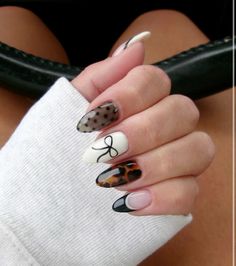 Bow nails, cheetah, polka dots, black white and brown nails, fall nails Sheer Polka Dot Nails, New Year Eve Nails Design 2024, Black And White Christmas Nail Designs, Black And White Holiday Nails, Winter Birthday Nails Almond, Bow Nail Ideas, Nails December 2024, Winter Nail Designs 2024, Pattern Nails Designs