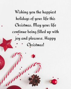 a christmas card with candy canes and decorations on the bottom right corner, says wishing you the happiest holidays of your life this christmas