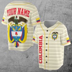 a baseball jersey with the flag of colombia on it and an eagle in the center