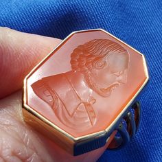 I am pleased to offer from my private collection this absolutely amazing and historically important antique ring made c1880 - 1920. Real solid gold carnelian duke's signet ring. Genuine incredibly beautiful and rare 18k Victorian ring. Beautiful carnelian intaglio carved ring it's perfect for man or woman. Overall a very rare and unique antique seal ring. 18 karat gold ring setting is handcrafted with beautiful deco design pattern. Hard stone carved engraved carnelian portrait. EARLY VICTORIAN 1 Luxury Carnelian Gemstone Signet Ring, Luxury Ceremonial Engraved Ring With Intaglio, Luxury Diamond Intaglio Rings, Classic Luxury Intaglio Rings, Luxury Heirloom Intaglio Rings, Luxury Ceremonial Engraved Intaglio Ring, Luxury Intaglio Rings For Women, Luxury Ruby Ring With Intaglio, Luxury Timeless Intaglio Ring