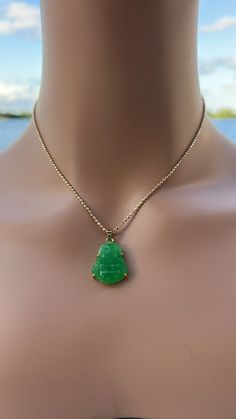 This necklace is perfect for those that love dainty jewelry and small charms . Information: ✨ Genuine green Jade stone, carved with the image of the laughing Buddha. ✨ Tarnish resistant: please avoid contact with lotions, perfumes and frequent showers. Buddha's are known for their ability to attract peace and wealth to the wearer, a simple scratch in the belly can set your intentions for the necklace. This necklace makes a perfect gift, especially for someone seeking more abundance into their life's. Jade Stone Necklace, Spiritual Green Jewelry With Adjustable Chain, Green Jade Necklaces With Lobster Clasp, Green Jade Necklace With Lobster Clasp, Jade Necklace With Lobster Clasp As A Gift, Green Crystal Pendant Necklace With Adjustable Chain, Jade Necklace With Lobster Clasp For Gift, Green Pendant Crystal Necklace With Adjustable Chain, Green Spiritual Pendant Necklace