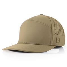 a tan cap with perfored details on the front