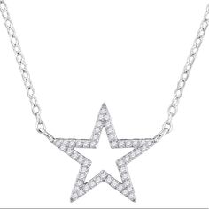 10k White Gold Womens Round Diamond Star Outline Pendant Necklace With 18" Chain 1/8 Cttw Product Specification Gold Purity & Color 10kt White Gold Diamond Carat Weight 1/8 Ct.T.W. Diamond Clarity / Color I2-I3 / J-K Gram Weight .74 Grams (Approx.) Style Stars Includes Chain? Chain Attached Item Number Gnd-97813 Combined Diamond Weight Of 1/8 Carats Total Weight Represents A Range Of 0.12 - 0.14 Cts. T.W. Star-shaped Diamond White Necklace With Single Cut Diamonds, Sterling Silver Star-shaped Diamond Necklace, Sterling Silver Star Diamond Necklace With Accents, Sterling Silver Star Diamond Necklace, Sterling Silver Star Necklace With Diamond Accents, White Gold Star Necklace Fine Jewelry, White Gold Star Necklace With Clavicle Chain, White Star-shaped Diamond Jewelry, Star Outline