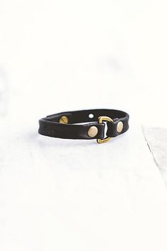 Handcrafted from lambskin leather, the Do Good bracelet features an antique brass D-ring with two large flat rivets. **Contents** * Lambskin leather, antique brass hardware * Button clasp closure * Handmade **Care/Import** * Made in the USA **Dimensions** * Adjustable to fit wrist sizes 6.5”-8” | Giving Bracelets Antique Brass Do Good Leather Bracelet at Free People in Black Good Bracelet, Leather Bracelets Women, Bracelets Women, Antique Brass Hardware, Nice Leather, Leather Jewelry, D Ring, Brass Hardware, Lambskin Leather